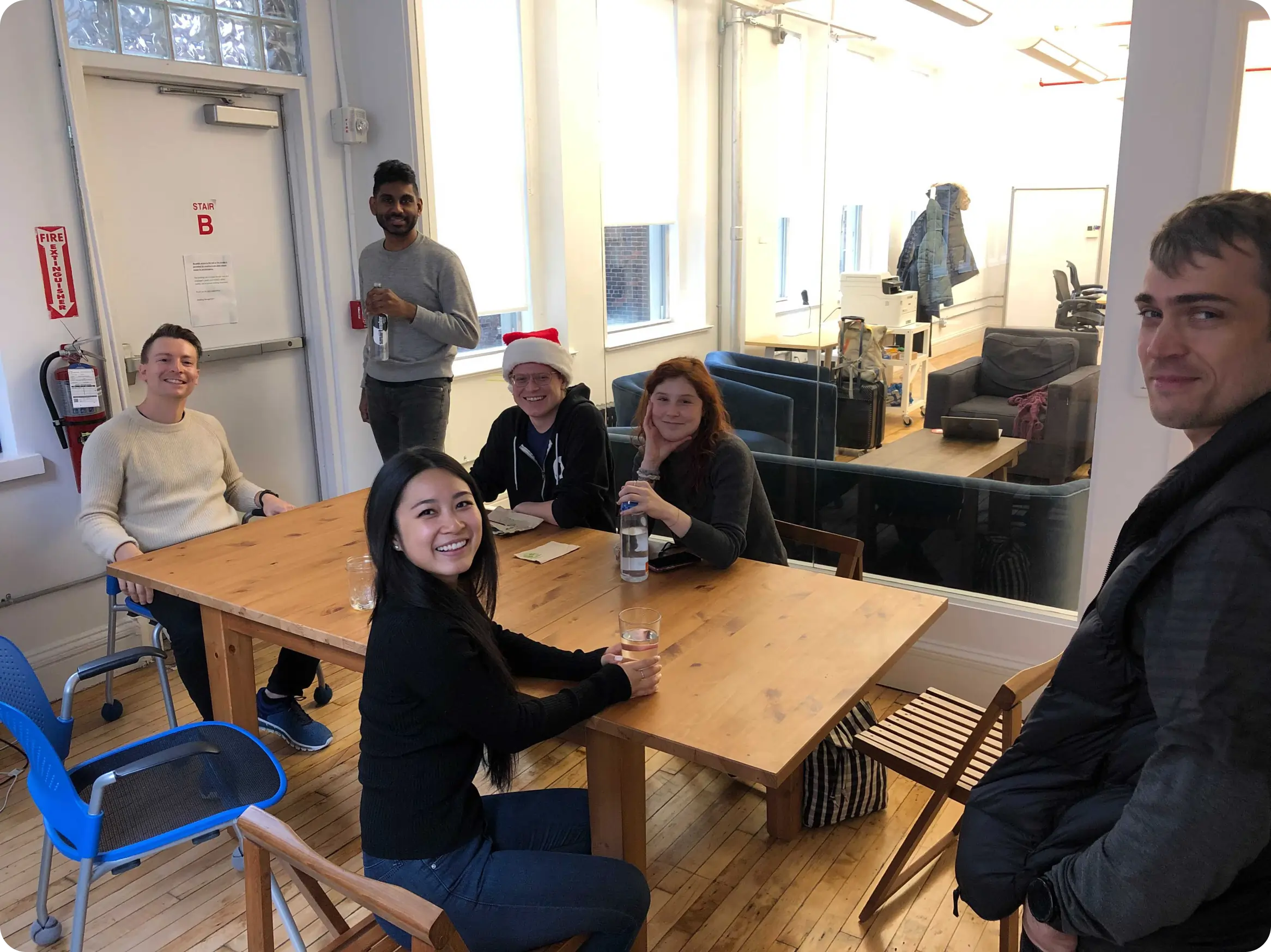 people sitting on kitchen table